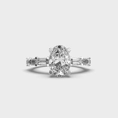 an oval and baguette diamond ring