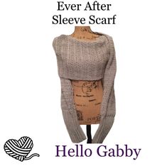 a mannequin wearing a sweater with the words, ever after sleeve scarf