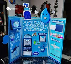 an open blue box with various items inside it and the words cabad written in large letters