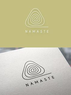 the logo for namaste is shown on top of a white paper with black ink