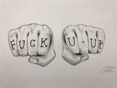 two fists with the words luck and u - up written on them in black ink