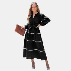 The V-neck Belted Long Puff Sleeve Maxi Dress combines several trendy and flattering design elements into one stylish and versatile piece. With its feminine silhouette, romantic puff sleeves, and defined waistline, this dress offers a chic and elegant option for various occasions, from formal events to casual summer outings. Whether you're attending a brunch with friends or a special evening event, this dress will ensure you stand out with style and sophistication. Product code: CAA05A4F170AC Casual V-neck Maxi Dress With Gathered Sleeves, Chic V-neck Maxi Dress With Smocked Cuffs, Black V-neck Ruffled Maxi Dress, Black Floral Print Maxi Dress With V-neck, Black Relaxed Fit V-neck Maxi Dress, Maxi Jersey Dress, Dress With Tie, Long Puff Sleeves, Tiered Maxi Dress