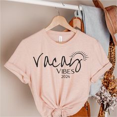 Vacay Vibes 2024 Shirt, Vacay Vibes Shirt, Vacation Shirt, Family Vacation Shirt, Vacay Mode Shirt, Travel Shirt, Travel Gifts, Summer Shirt GUIDANCE  *All our simple color  t-shirts are 100% Cotton.   *All our Heather Color t-shirts are 90% cotton 10% polyester blend and they are extremely soft. Our design are made very professionally with the right equipment  *Soft and High-Quality Fabric *Taped shoulder-to-shoulder *Tear away label *Retail fit *Pre-shrunk * Side Seamed *Design size and placem Travel Vibes, Boat Trip, Matching Gifts