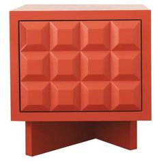 an orange cabinet with many cubes on the top and bottom, sitting in front of a white background