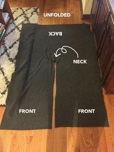 an unfolded pair of black pants with the words neck and front printed on them