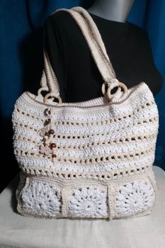 Crocheted shopping bag that has a small wallet that can be removed to help you leave your personal belongings so they won't get lost. It can be used for the beach as well as for shopping in stores. The size is not too big but also not too small. It is crocheted from cotton twine, very durable and strong, so that the bag can bear the weight. It can be used mostly in the summer months, but also throughout the year. The colors are bright and fit mostly with any everyday outfit. Size: 32 cm with 40 cm bag handles 59cm long with 3.5cm wide, the height from the top of the bag to the top of the bag handles is 33cm  wallet  15cm with 9cm material: 100% cotton twine wooden ornaments and wooden hoops The bag is unique and there is only one! Cream Rectangular Crochet Bag For Travel, Summer White Crochet Bag With Top Carry Handle, White Crochet Bag With Top Carry Handle For Summer, Cream Crochet Travel Bag, Large White Bag With Top Carry Handle, White Shoulder Bag With Top Carry Handle For Vacation, Lightweight Crochet Shopping Tote Bag, Lightweight Crochet Tote Bag For Shopping, Lightweight Tote Crochet Bag For Shopping