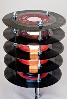 a stack of records sitting on top of each other