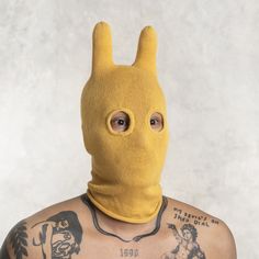 MANGO SOCKY BALACLAVA - BLAMO CLOTHING BALACLAVA We like to think of Socky as the outer manifestation of your inner wild child. Surreal, silly, and certainly singular, our better balaclava is designed to jumpstart your adventure times. FEATURES Hand knit 100% cotton (mango / gold / marigold colorway) One size fits all CARE Machine wash gentle cycle, hang to dry ----- FOR OTHER MASK OPTIONS, PLEASE VISIT OUR OTHER ETSY STORE, BLAMO TOYS, AT https://www.etsy.com/shop/BlamoToys BLAMO NEWSLETTER: https://manage.kmail-lists.com/subscriptions/subscribe?a=QfdKRs&g=PCw4jr WEBSITE: blamo.store Thanks for visiting. Feel free to email us with any questions, suggestions, or comments. Balaclava Mask, Animal Mask, Stocking Cap, Animal Masks, Yellow Knit, Poses References, Easy Halloween Costumes, Ski Mask, Wild Child