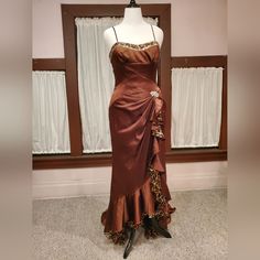 My Gowns Are Not Pre Owned. They Have Not Been Worn, Or Altered. This Gorgeous Chocolate Brown Is So Rich And Pretty. This Gown Has A Little Leopard Print Lining Peeking Out! It's Both Sophisticated And Fun. The Optional Modesty Panel Can Be Worn Beneath The Laces. Size 14 Measures: Bust 39.5"-40.5" Waist 33"-34" Hips 40" The Lace Up Back Allows You To Loosen Or Tighten The Bust And Waist A Little. Make Sure The Hip Measurement Is Accurate. It Has The Designer Hangtag And All Inside Labels Are I Glamorous Fitted Satin Mother Of The Bride Dress, Glamorous Fitted Ball Gown For Mother Of The Bride, Brown Fitted Evening Dress, Fitted Satin Ball Gown Evening Dress, Fitted Satin Gown For Formal Occasions, Fitted Ruffles Mother Of The Bride Evening Dress, Brown Floor-length Wedding Dress, Fitted Satin Floor-length Mother Of The Bride Dress, Fitted Sleeveless Satin Mother Of The Bride Dress