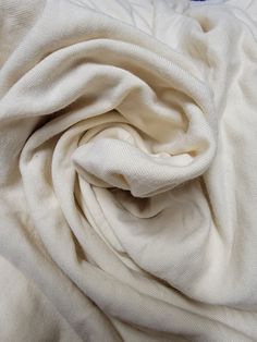 It's as soft as butter, has a beautiful stretch, recovery, and drape. Great for hoodies, pants, pullovers or whatever you have in mind.Face side is soft and flat, back is soft, fuzzy and warm. A yard is 36" length and 60"wide. If you purchase more than 1 yard, you'll receive it 1 contious peice.  Fabric content 66% Bamboo 28% Organic Cotton 6% stretch. Natural Fibers, Cotton Spandex, Organic Cotton, Butter, Spandex, Craft Supplies, Fabric, Quick Saves