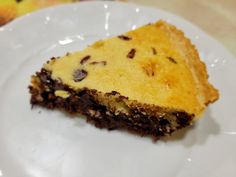 a piece of chocolate chip pie on a white plate