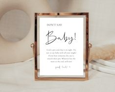 a sign that says don't say baby on it