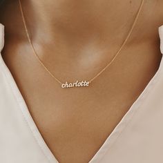 Our best selling script nameplate necklace just got an upgrade! This new, stone set pavé nameplate will quickly become one of your favorites - customize it with your name, or the name of someone you love. This dainty piece is the perfect way to add some extra sparkle to your day. It is beautiful on its own, but also layers perfectly with any Tiny Tags necklace! available in sterling silver, gold vermeil, and 14k yellow gold offered in lowercase ONLY - each letter is approx. 4-6mm in size stones are .8mm silver and gold vermeil have cubic zirconia stones 14k gold has real diamonds available on 14-16" or 16-18" adjustable cable chain production time is 15-20 business days, regardless of shipping selected at checkout Gold Custom Necklace, Personalized Name Necklace, Tiny Tags Necklace, Mom Necklace Personalized, Tiny Tags, Nameplate Necklace, Gold Name Necklace, Mom Necklace, Circle Necklace