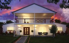 a large white house sitting on top of a lush green field under a purple sky