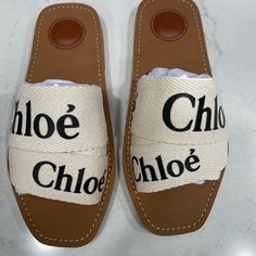 Chloe Woody Sandals Size 38 Brand New. Never Worn Runs Small. Fits Like A 7 Or 7.5 Paid $512. Shoes Were $475 Plus Tax And Shipping Designer Round Toe Mules For Beach, Designer White Slip-on Mules, Designer White Mules For Summer, White Designer Mules For Summer, Designer White Mules For Spring, Chloe Woody Sandals, Open Toe Sandals Heels, Ribbon Sandals, Chloe Sandals