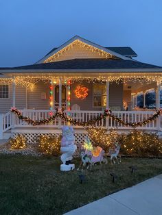 a house decorated with christmas lights and decorations