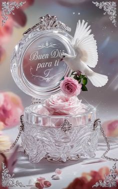 a glass box with flowers and a bird on it that says, bonn diff para ti