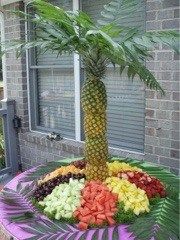 a palm tree made out of fruits and vegetables