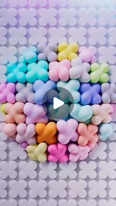 an image of colorful hearts arranged in the shape of a heart on a white background