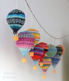 multicolored hot air balloons hanging from the ceiling