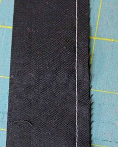 a piece of black fabric that has been stitched together