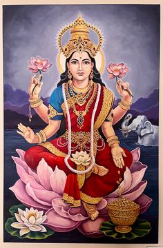 the hindu goddess sitting on top of a lotus flower