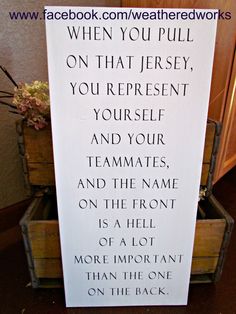 a sign that says when you pull on that jersey, you represent yourself and your teammates