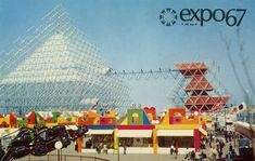 an advertisement for the expo in front of a large building with many people walking around it