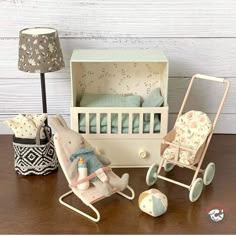 a baby's room with toys on the table