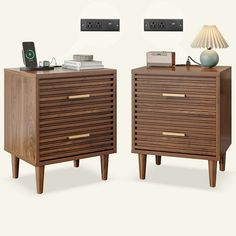 two wooden nightstands side by side, one with a phone on top and the other with an alarm clock