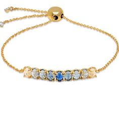 Gold Plated Tai Blue Ombre Stone Adjustable Pull Tie Bracelet - Nwt - Gold Plated Over Brass - 9 Blue Ombre Colored Glass Crystal Stones In A Row - Adjustable Pull Tie At Back - Brand New W/ Tags, Pouch & In Gift Box From Neiman Marcus Tai Jewelry, Blue Stone Bracelet, Crystal Stones, Ombre Color, Blue Ombre, Glass Crystal, Stone Bracelet, Blue Stone, Womens Jewelry Bracelets