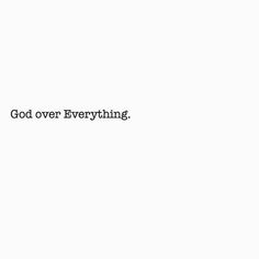 the words god over everything are in black and white