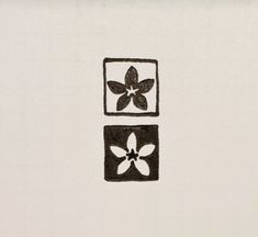 a black and white drawing of two squares with flowers on them, one has a flower in the middle