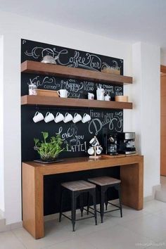 a coffee bar with chalk writing on the wall