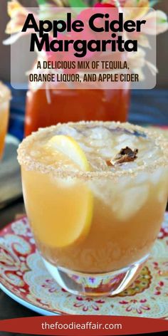 an apple cider margarita in a glass on a plate with the title above it