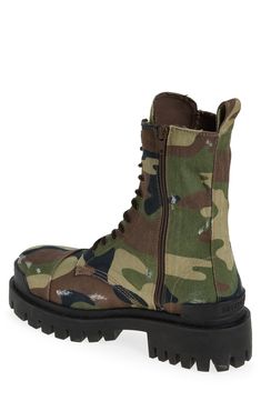 A superchunky lug sole amplifies the robust attitude of this lace-up combat boot fashioned from camo-print cotton canvas that bears its share of battle scars. Lace-up style Textile upper and lining/rubber sole Made in Italy Designer Shoes Balenciaga Boots, Combat Boots Style, Combat Boots Men, Camo Shoes, Battle Scars, Lug Sole Boots, Lace Up Combat Boots, Boot Print, Combat Boot