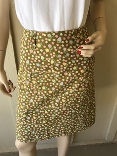 Vintage 1960's Skirt ~ Patty Woodard, California, Olive Green W/ Tiny Pink Flowers, Zips Up The Back With Big & Wide Belt Hoops Belt ~ Great Condition I will be mailing this Priority Mail and First Class International. Measurements Skirt Waist 24 Inch Hips Bone 32 Inch Tush 36 Length 21 Inch Spring Vintage Fashion Fitted Skirt, Fitted Vintage Fashion Skirt For Spring, Fitted Skirt For Spring Vintage Fashion, Vintage Retro Print Skirt For Spring, Vintage Skirt With Retro Print For Spring, Retro Fitted Short Skirt, Retro Bottoms For Spring In Vintage Style, Spring Vintage Skirt For Vintage Fashion, Retro Skirt With Retro Print For Spring