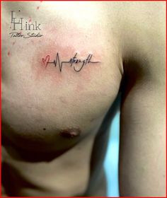 a close up of a person's chest with the word think written on it