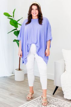 No need to compare this cutie, this is the perfect top for you! The comfy, flowy fit makes this tunic a go-to for comfort and style! Plus, the gorgeous lavender color adds a touch of sass to any outfit! Expertly crafted for ultimate comfort and style! 100% Cotton Lavender Top For Layering In Fall, Lavender Tops For Fall Layering, Lavender Top For Fall Layering, Oversized Purple Tops For Layering, Versatile Flowy Tops For Loungewear, Flowy Short Sleeve Tops For Loungewear, Spring Oversized Purple Tops, Oversized Purple Tops For Spring, Oversized Purple Top For Loungewear