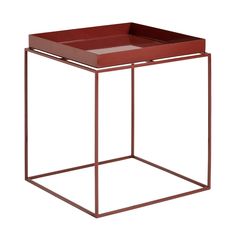 a red tray sitting on top of a metal stand with an open bottom and two sides