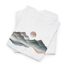 Awaken Your Spirit with Our Mountain Sunrise T-Shirt! Celebrate the beauty of nature with our stunning Mountain Sunrise T-shirt, featuring a breathtaking design of majestic mountains against a radiant rising sun. This tee embodies the perfect blend of adventure and tranquility, making it an ideal choice for outdoor enthusiasts and those seeking a connection with nature. Crafted from soft, high-quality fabric, this T-shirt offers both comfort and style, allowing you to express your love for the great outdoors. Whether you're hiking, camping, or simply enjoying a peaceful day in the sun, this shirt serves as a reminder to embrace life's beautiful moments. Why You'll Love It: Striking Design: The captivating mountain and sunrise graphic creates an inspiring focal point. Versatile Style: Perfe Sunrise Graphic, Peaceful Day, Mountain Sunrise, Adventure Outfit, Majestic Mountains, Embrace Life, Rising Sun, Great Outdoors, Beautiful Moments