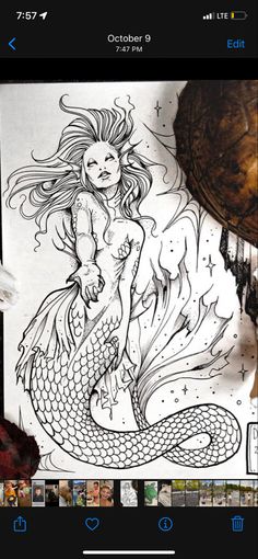 an image of a mermaid with her hair blowing in the wind