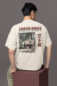 Step into the fast lane with our Tokyo Drift Japan T-shirt, a bold and stylish addition to your wardrobe that captures the essence of Tokyo's dynamic street culture. This shirt is designed for those who love to stand out, featuring eye-catching graphics on both the front and back that celebrate the spirit of Japan's urban scene. Versatile Color Palette: Available in nine vibrant colors, our Tokyo Drift Japan T-shirt offers a hue for every personality and mood. Whether you prefer classic black, s Japan Shirt Design, Japan Tshirt Design, Car Tshirt Design, Tokyo Streetwear, Cars Japan, Tokyo Drift Cars, Tokyo Drift, Cooler Look, Street Culture