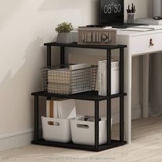 a black shelf with baskets and books on it in front of a white desk area