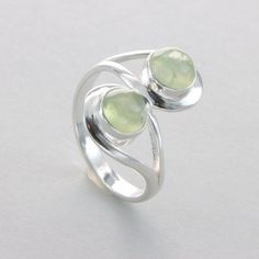 These is a beautiful Sterling Silver Ring with a Prehnite Gemstone from South Africa. The ring is made out of solid 925 Silver and there is no nickel or other substances causing most allergies. This makes the ring hypo allergenic. Size of the Prehnite 2 x 0.7 x 0.7 cm or  2 x 0.28 x 0.28 inch Please note: Our jewelry is photographed close up to show detail and may appear larger than they are. We use a dime coin as size reference on one of the pictures. You will receive the item in a gift box - perfect to surprise someone or yourself. Usually we ship on the same day we receive the payment for the order. We want you to be happy with your purchase. If you do not like what you bough can send it back and we will refund you the money. Please do not hesitate to contact us so we can solve any issu Handcrafted Artisan Jewelry, Round Circle, Rings Statement, Artisan Jewelry, Statement Rings, South Africa, Natural Gemstones, Silver Ring, Sterling Silver Rings