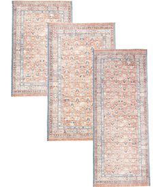 three rugs in different colors and patterns on a white background, one with an orange border