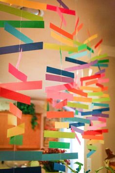 some colorful streamers hanging from the ceiling