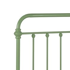 a green metal bed frame with rails and headboard posts on an isolated white background