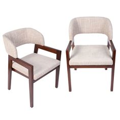 a pair of chairs sitting next to each other