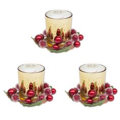 three glasses with christmas decorations on them